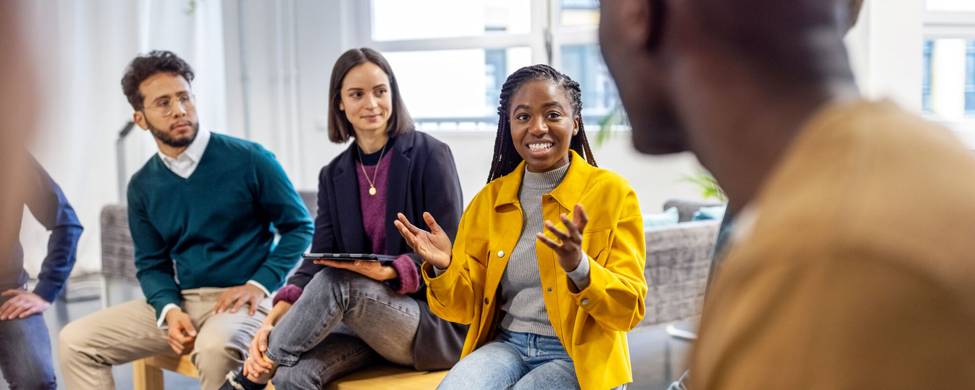 Team having a discussion in an office.